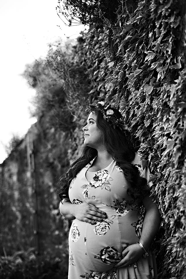 pregnant woman looking off in distance