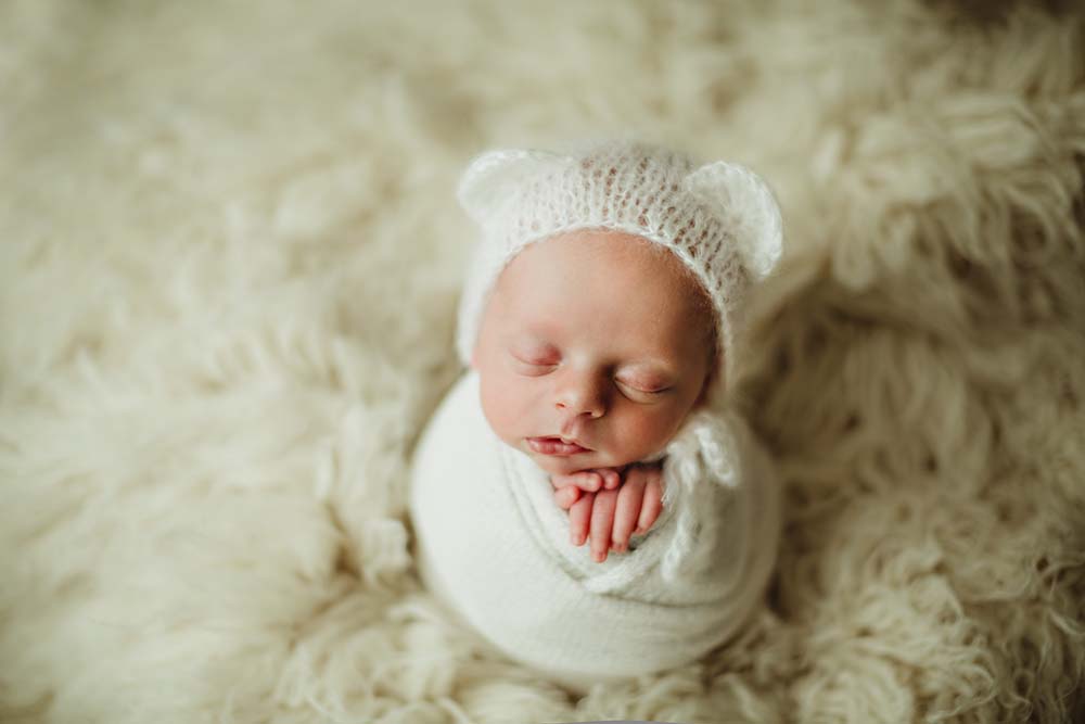 newborn in white