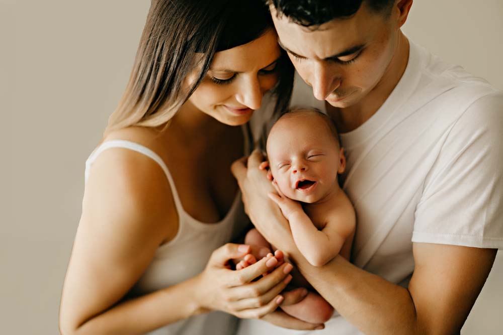 newborn with parents