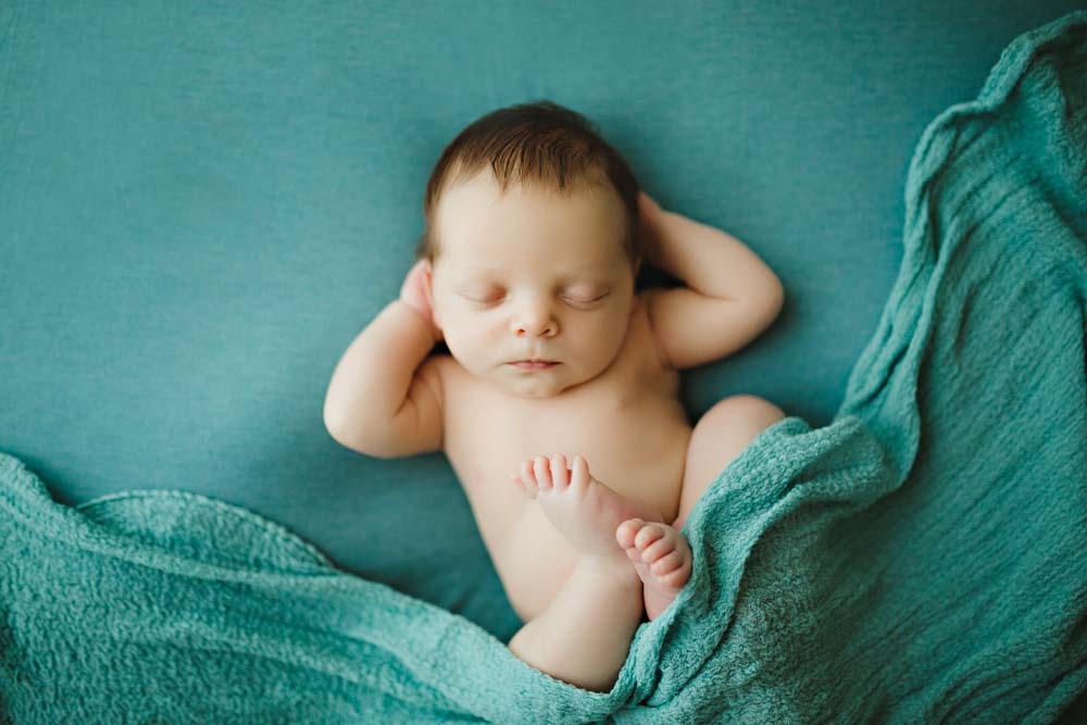newborn in turquoise